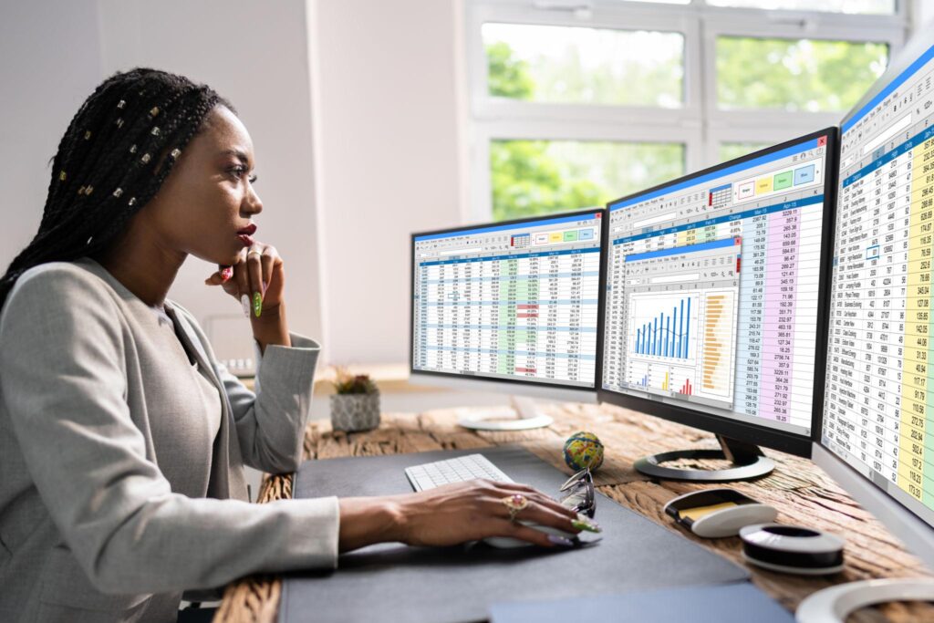 Business analyst managing legacy excel and database reporting processes