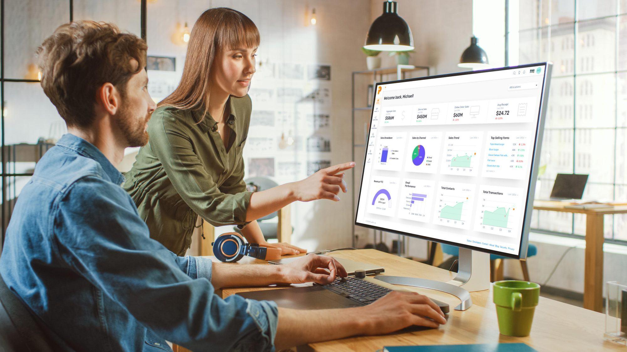 Business users exploring governed self service analytics dashboards