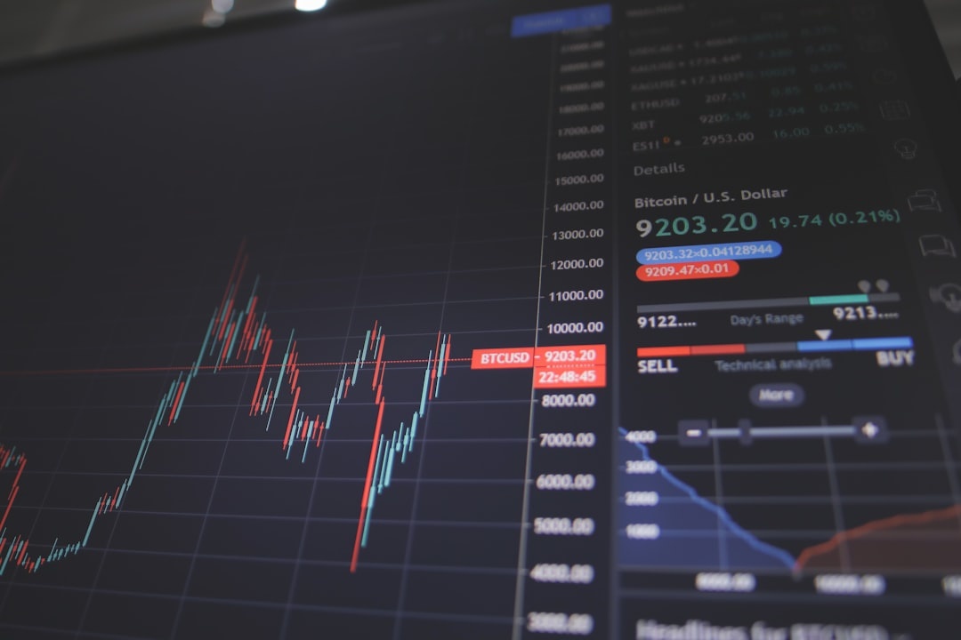 Business analytics and budget forecasting dashboards displayed on screens