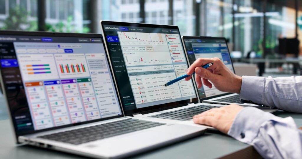 Business analyst reviewing transaction records and changes captured in an application audit history