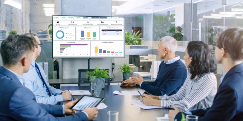 Business intelligence team reviewing power bi row level security for regional data access
