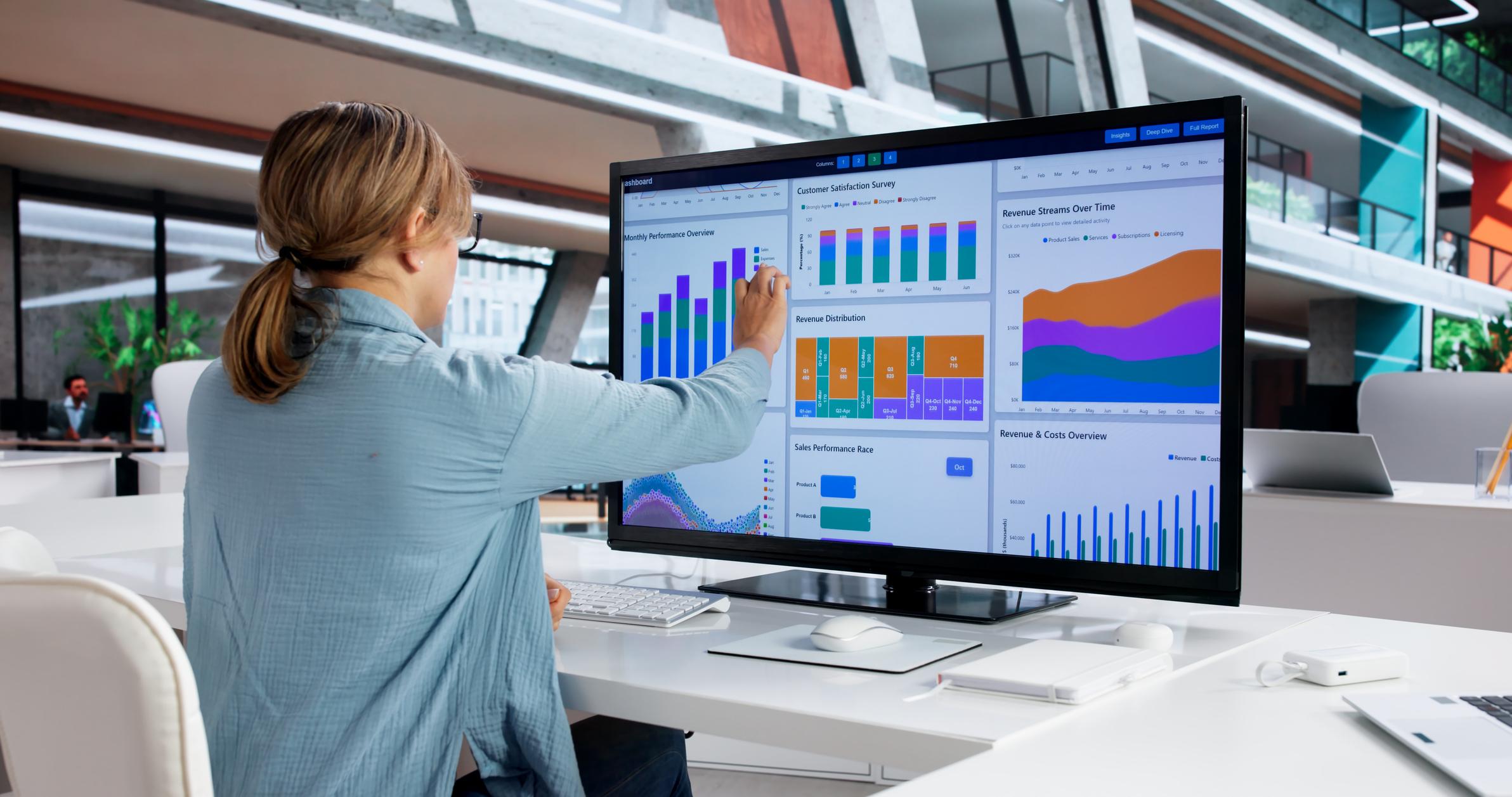 Business professional reviewing bi dashboard testing and data validation