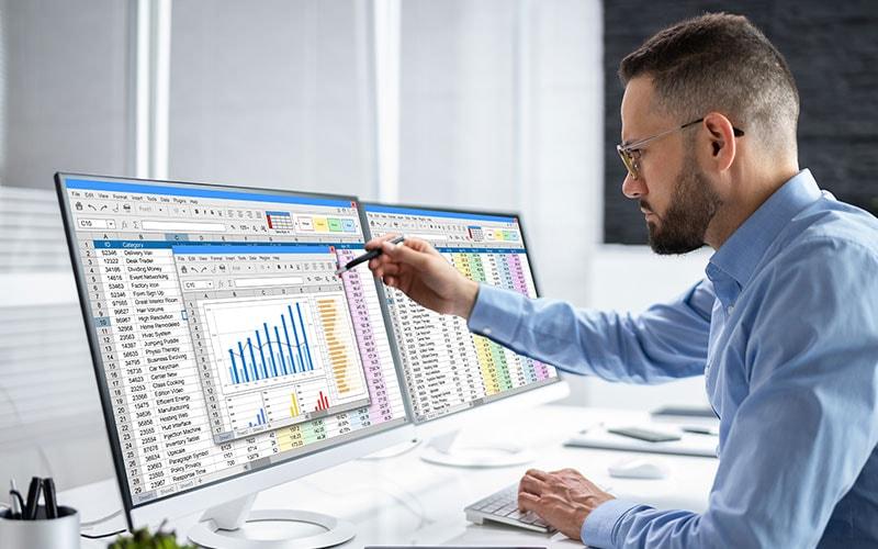Data analyst validating record counts and data quality before production release