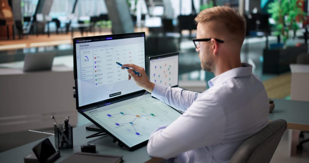 It professional reviewing permissions and validation controls for business dashboard actions